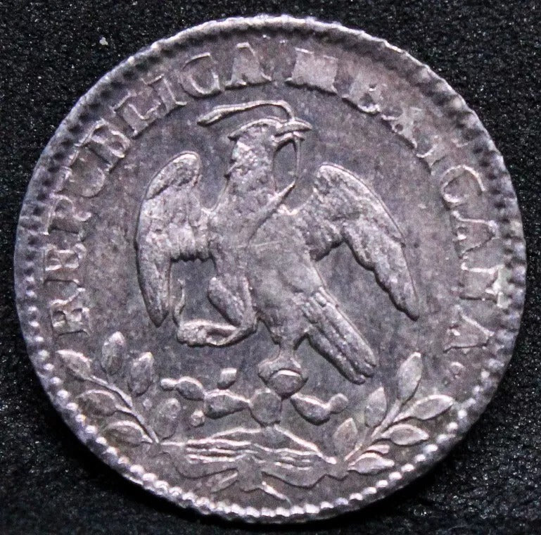 1/2 real 1859 Mo-FH. Mexico. KM-370. UNC (purple toning) NGC MS64
