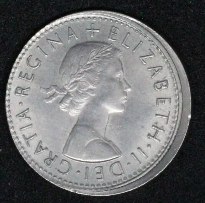 1966 6 pence error coin, 20% off centre strike