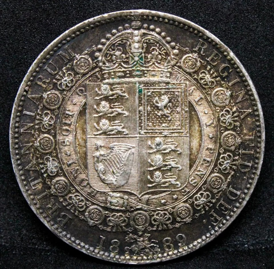 1889 1/2 Crown, Queen Victoria. KM-764 High Grade With Golden Toning
